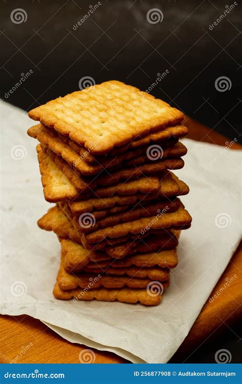 Snack Concept Salty Crackers Or Biscuits Arranged In Vertical Row On