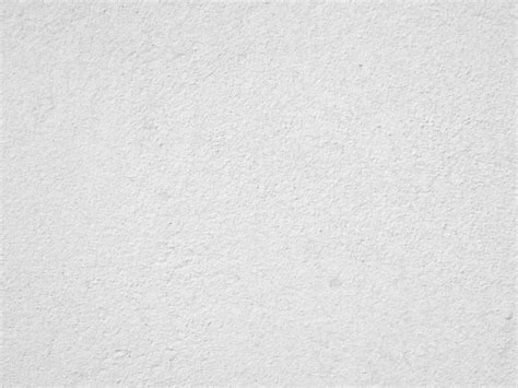 Seamless texture of white cement wall a rough surface, with space for ...