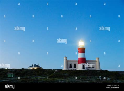 South Africa, Western Cape, Agulhas National Park, Agulhas lighthouse at southernmost tip of ...