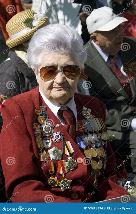 War Veteran Woman Portrait Her Jacket Is Decorated By Many Medals