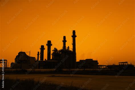 Gas turbine electrical power plant at dusk Stock Photo | Adobe Stock