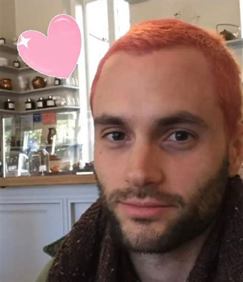 A Man With Red Hair Is Looking At The Camera And Has A Pink Heart Above