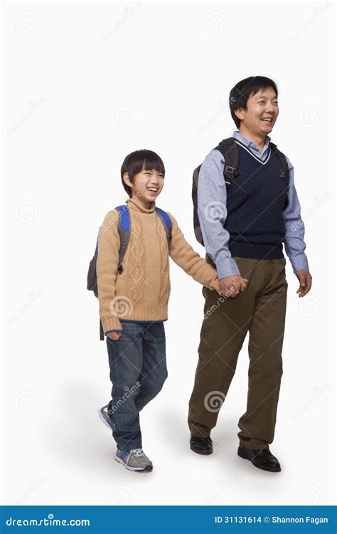 Father And Son Walking Away From Each Other