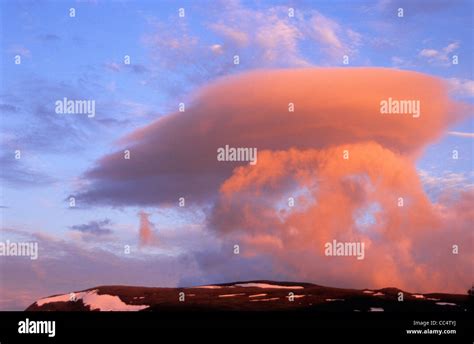 Sunset sky with an anvil cloud, Nordland, Norway Stock Photo - Alamy