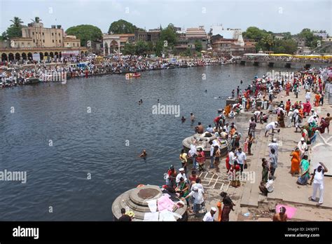 Crowds of people taking bath in indrayani river during Alandi yatra, Alandi Devachi, Pune ...