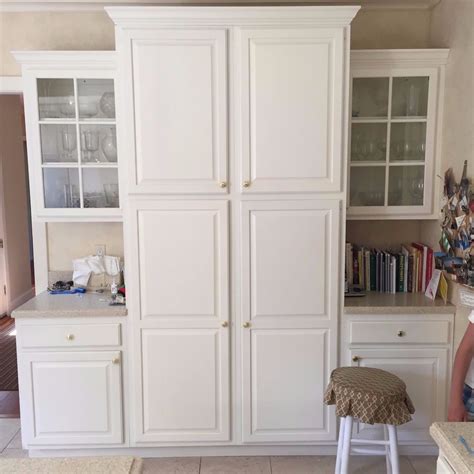 Add Elegant Storage With A White Tall Cabinet Home Cabinets