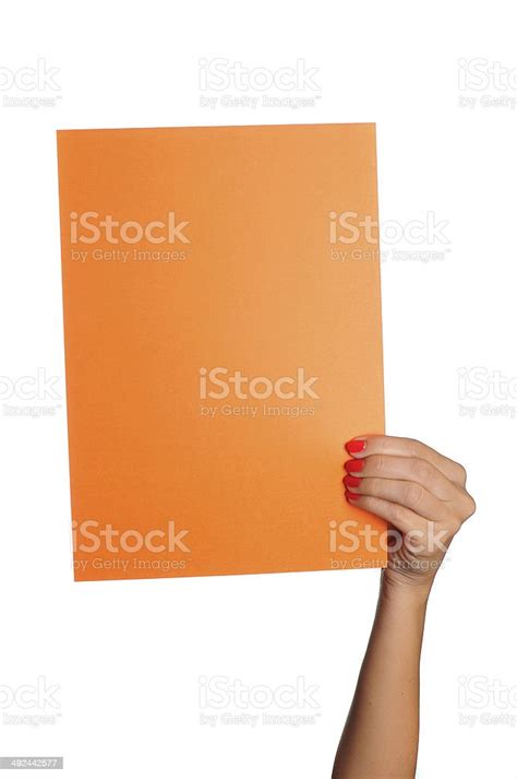 Woman Holding Orange Paper Board On Isolated White Background Stock