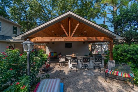 Total Exterior With Patio Cover And Outdoor Kitchen Traditional