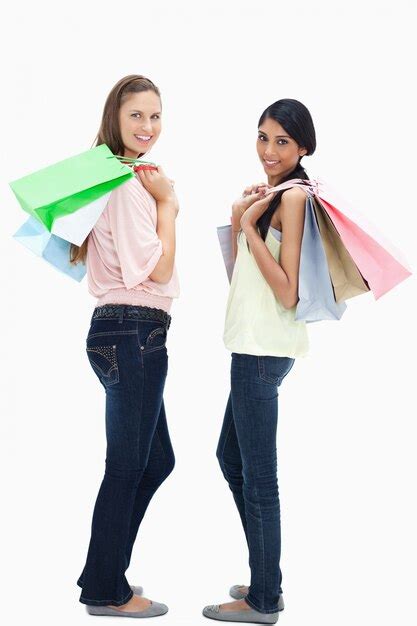 Premium Photo Smiling Women Carrying A Lot Of Shopping Bags