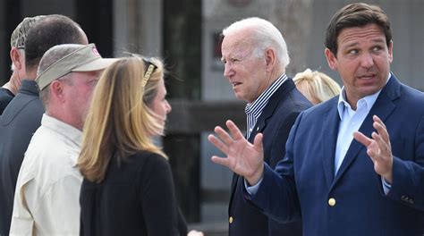 Biden Meets Political Rival Desantis In Florida While Touring Hurricane