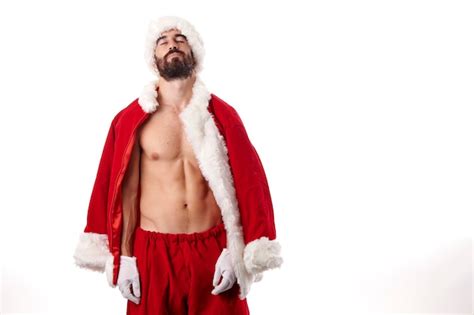 Bodybuilder Du Père Noël Exhibant Son Corps Athlétique Sexy Sur Fond