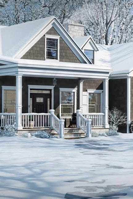 A Painting Of A House In The Snow