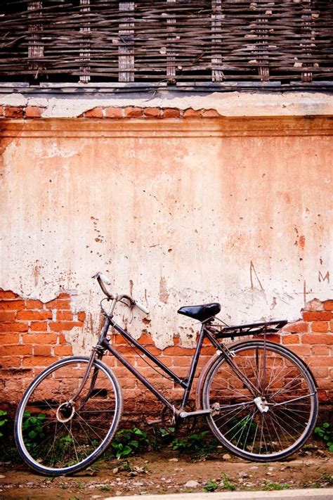 Old Bike Parked Beside The Vintage Old House Stock Image Image Of