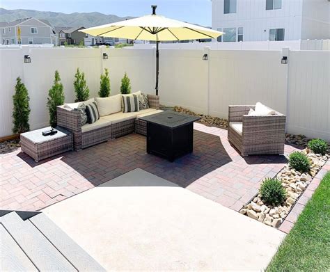 Brick Patio With Woven Furniture - Soul & Lane