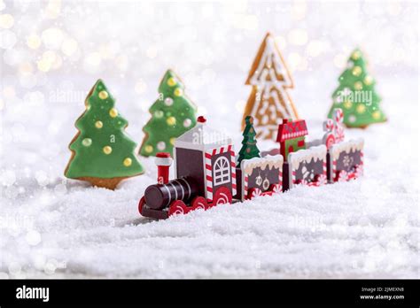 Christmas toy train with a Christmas tree and gifts Stock Photo - Alamy