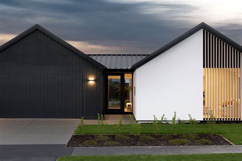 Benchmark Homes in 2025 | Facade house, Modern brick house, Gable house