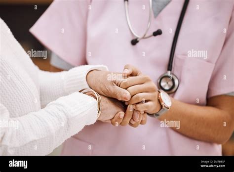 Support Empathy And Nurse Holding Hands With Patient For Compassion Trust And Comfort From