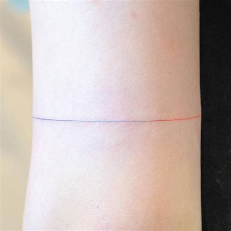 Spectrum Bracelet Tattoo Located On The Bicep