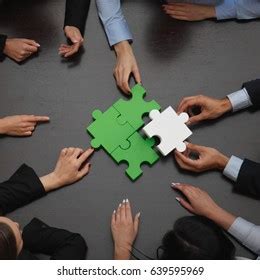 Group Business People Assembling Jigsaw Puzzle Stock Photo Edit Now