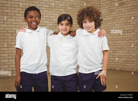 Happy Pupils Looking At The Camera Stock Photo Alamy