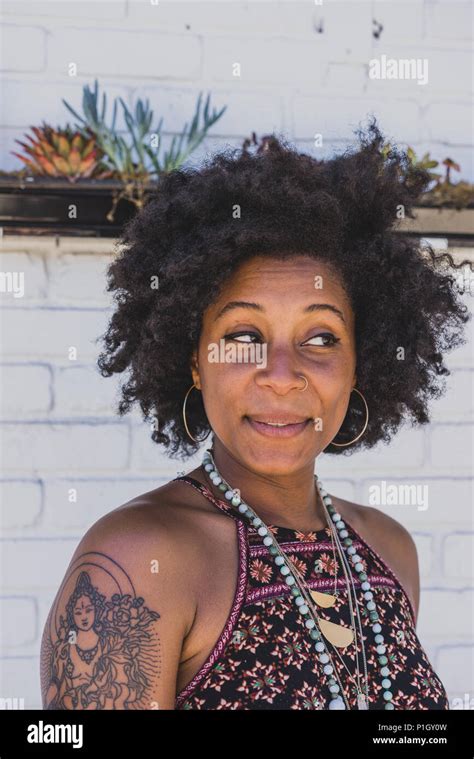 Portrait of smiling black woman Stock Photo - Alamy