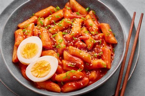 Tteokbokki With Eggs In Gray Bowl On Concrete Table Top Tteok Bokki Is