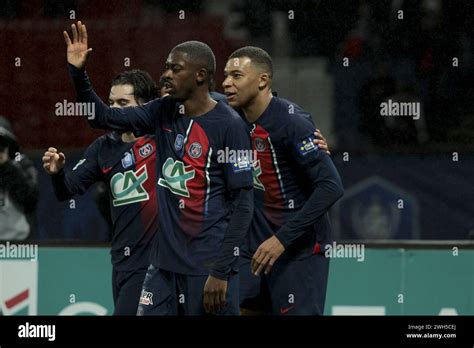 Kylian Mbappe Of PSG Celebrates His Goal With Ousmane Dembele Left