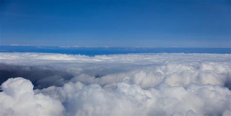 Premium Photo | Blue sky with clouds aerial photography