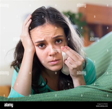 Upset Lonely Woman Crying On Couch At Home Stock Photo Alamy