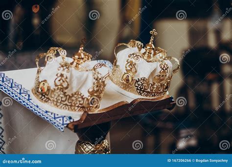 Golden Christianity Crowns On Altar In Church For Wedding Ceremony