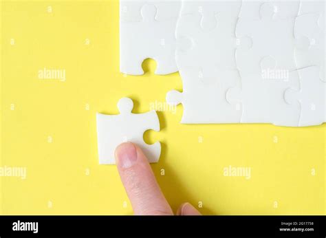 Completing Jigsaw Hi Res Stock Photography And Images Alamy