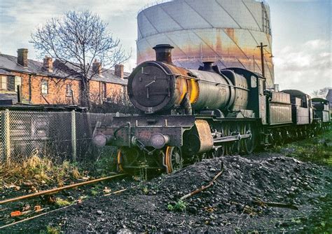 Old Train Parked On Tracks