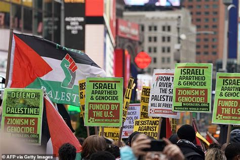 Fury As Palestinian Protester Waves A Swastika At Anti Israel Rally In