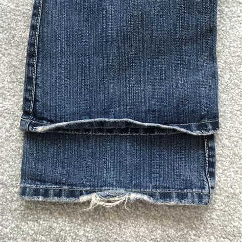 Y K Mid Rise Flared Jeans In A Mid Wash Blue Depop