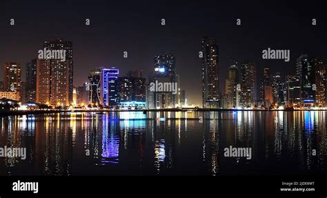 Sharjah, UAE February 24, 2020: at night city buildings and avenues of ...