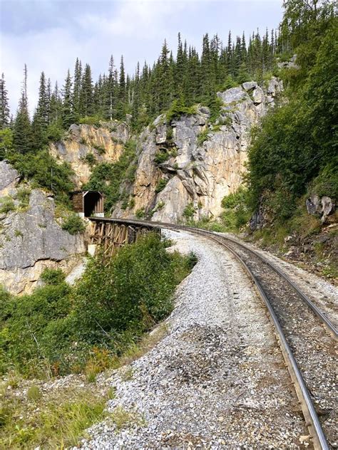 Train Tracks Running Through A Mountain Range Stock Photo Image Of