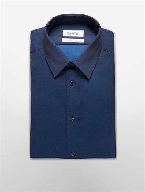 Calvin Klein Steel Slim Fit Non Iron Solid Poplin Dress Shirt In Blue