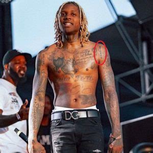 Lil Durk's 46 Tattoos & Their Meanings - Body Art Guru