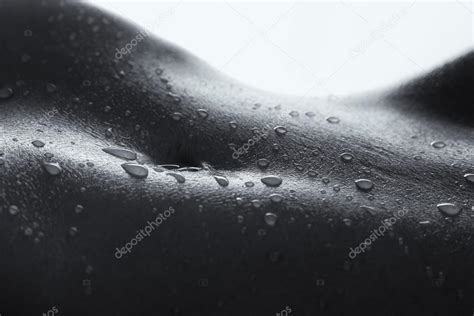 Bodyscape Of A Nude Woman With Wet Stomach And Back Lighting Art Stock