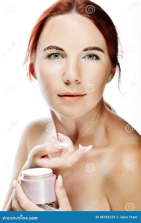 Young Smiling Woman Applying Cream On Her Face Stock Image Image Of