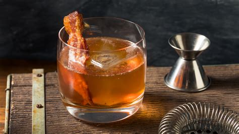 The Irish Breakfast Shot Features Whiskey Orange Juice And A Strip Of Bacon