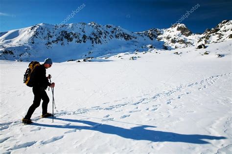 Alpinist traversing a glacier – Stock Editorial Photo © rechitansorin ...