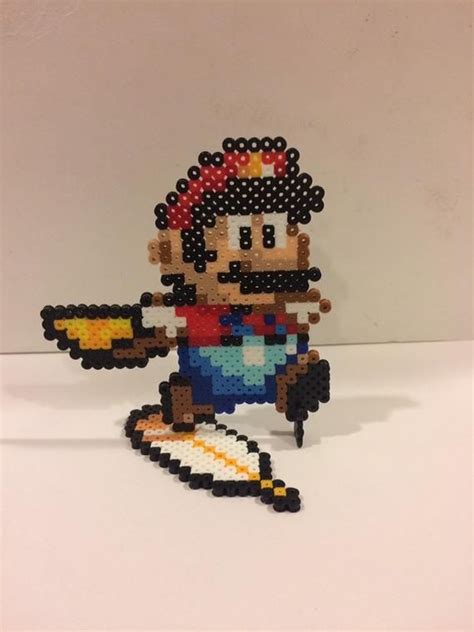 Super Mario World Perler Cape Mario With Stand Etsy Perler Bead Art Perler Perler Creations