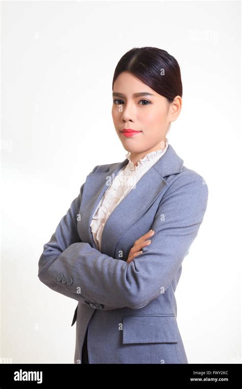 Business Woman Wearing A Suit Standing Arms Crossed Smiling With