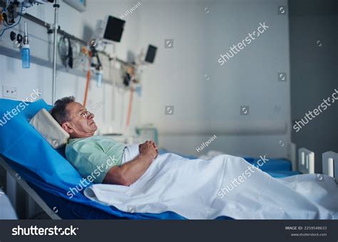 Sad Senior Man Lying On Hospital Bed Images Stock Photos Vectors