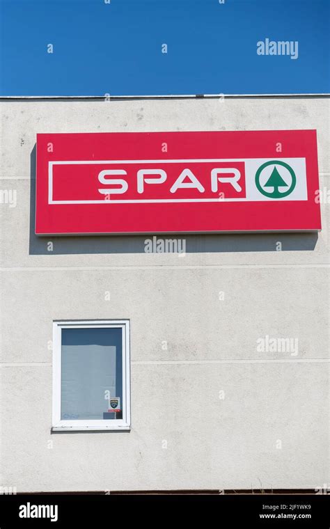 A Vertical Close Up Shot Of A Banner Of The Spar Supermarket Logo On A