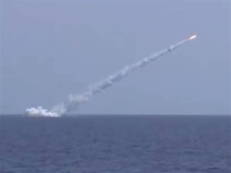 Russian submarine firing Kalibr cruise missile at IS target in Syria ...