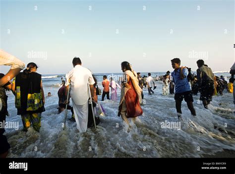 Tourists At Marina Beach In Madras Chennai Tamil Nadu India Stock