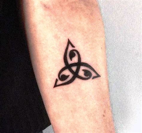 30 Amazing Triquetra Tattoos With Meanings Ideas And Celebrities