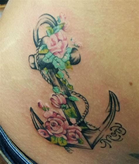 Flowers and anchor tattoo